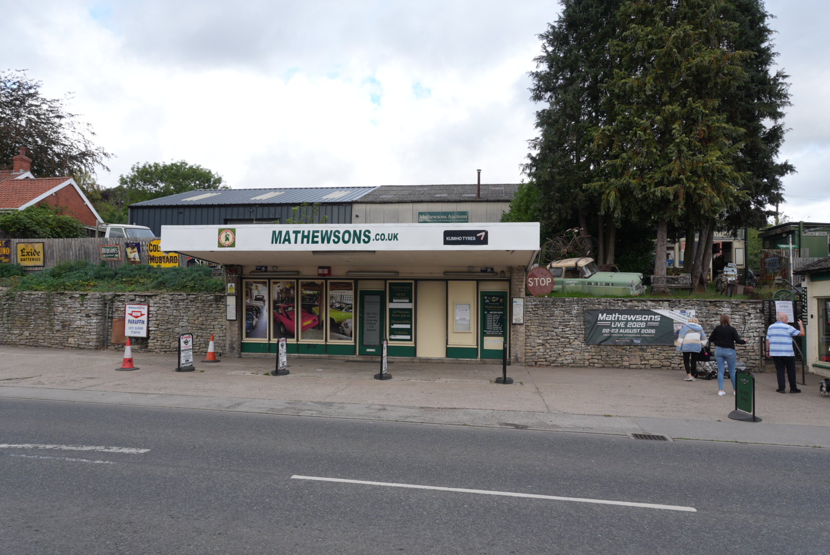 The Mathewsons premises on Pickering Road in Thornton-le-Dale, with the MATHEWSONS.CO.UK canopy over the forecourt and the A170 running past in the foreground