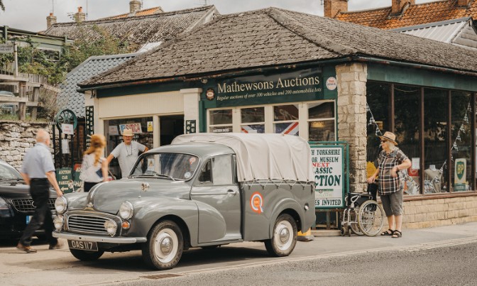 Classic cars lined up outside the Mathewsons auction house in Thornton-le-Dale