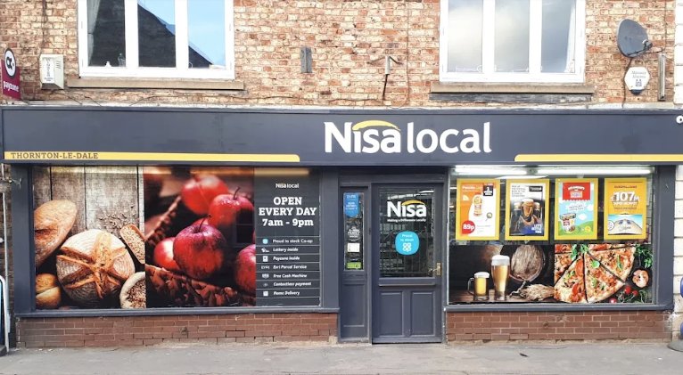 The Nisa Local convenience store on Pickering Road in Thornton-le-Dale: a brick frontage with a dark grey Nisa local sign, a yellow Thornton-le-Dale strip, and windows showing bread, apples and the opening hours